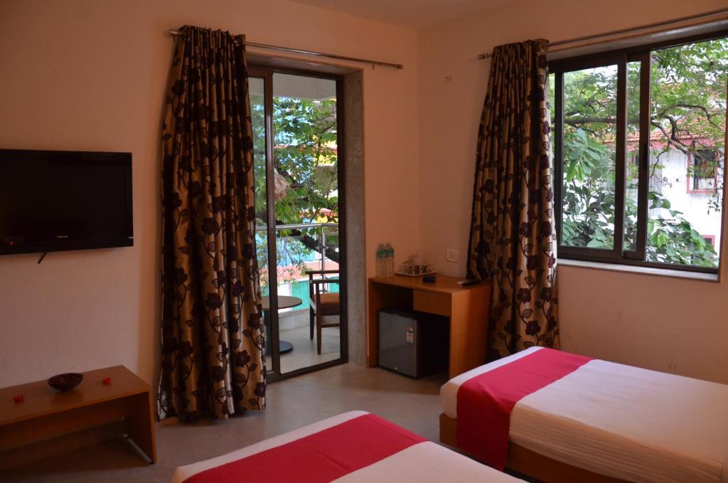 Hotel Sunkissed Plaza Calangute Zimmer foto