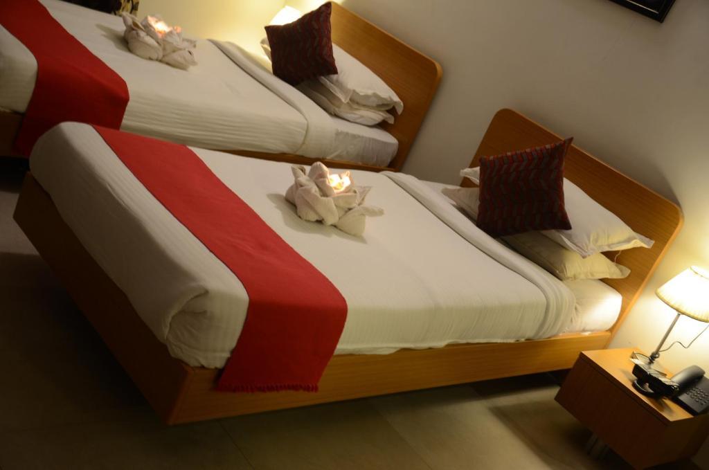 Hotel Sunkissed Plaza Calangute Zimmer foto