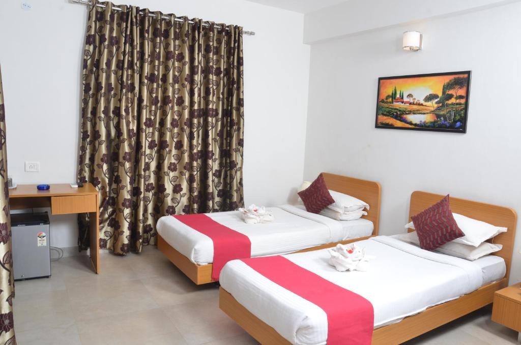 Hotel Sunkissed Plaza Calangute Zimmer foto